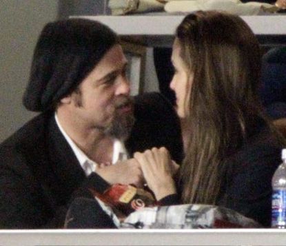 Brad Pitt and Angelina Jolie at the 2010 Superbowl