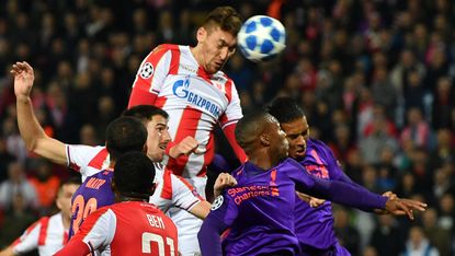 Milan Pavkov heads in Red Star Belgrade’s opening goal against Liverpool