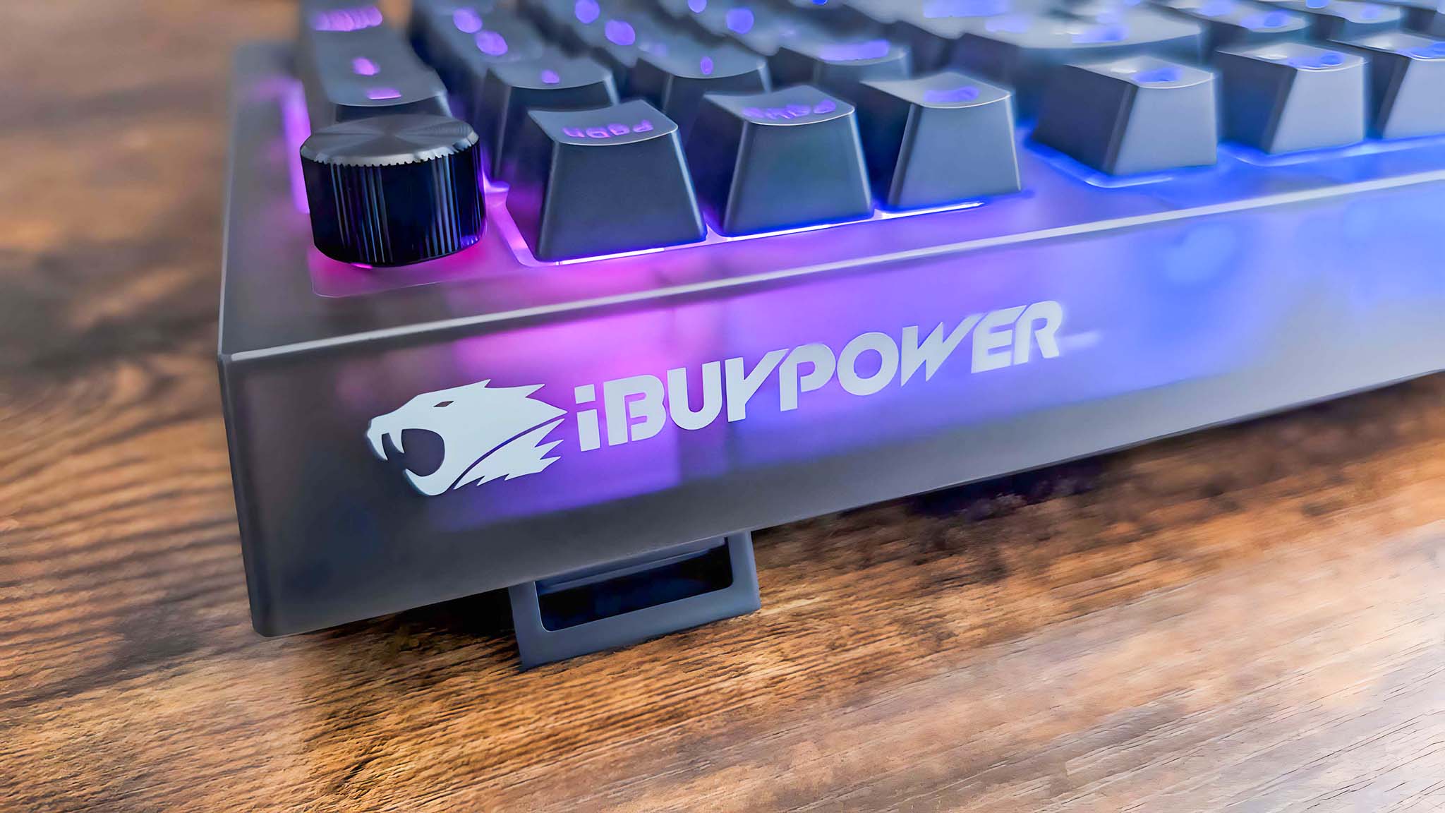 A closeup of the iBuyPower logo on the back of the MK9 Pro RGB Mechanical Keyboard.