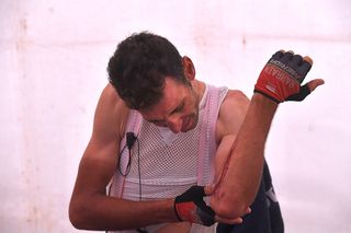 Following stage 20 at the Vuelta, Vincenzo Nibali checks for damage