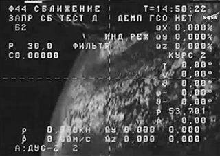 This image is a still from a video camera aboard Russia's Progress 59 cargo ship that showed the vehicle clearly spinning in orbit on April 28, 2015, shortly after its launch. Russian engineers are working to regain control of the unmanned spacecraft.