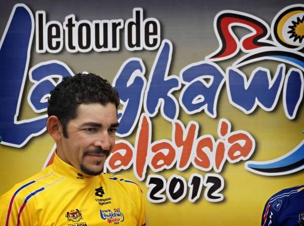 Jose Serpa (Androni-Venezuela) is used to post-stage protocol.
