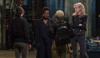 Widows Viola Davis and her crew discuss matters in a garage