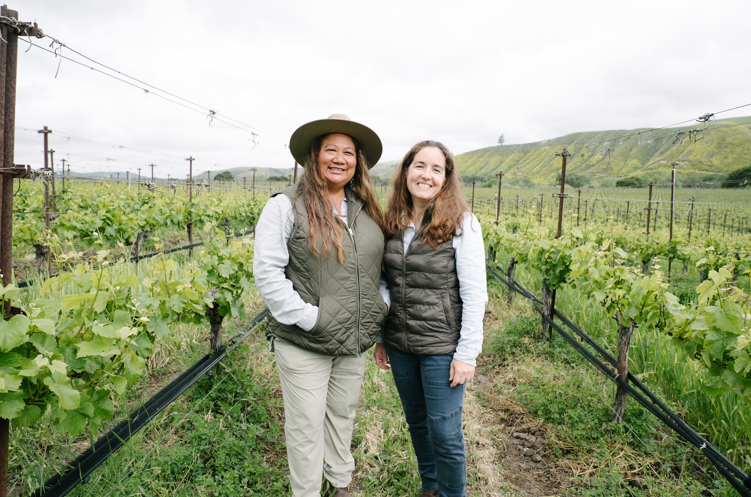 Tara Gomez, a member of the Santa Ynez Band of Chumash Indians and co-owner of Camins 2 Dreams with her wife, Mireia Tarib&amp;oacute;, in a sustainably farmed vineyard