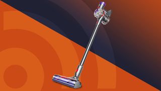 Dyson V8 against an orange and blue background