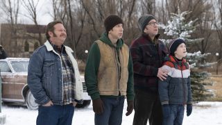 Flick, Schwartz, Ralphie and his son standing outside in A Christmas Story Christmas