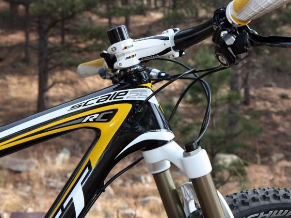 Derailleur cables are fed into the frame at the tapered head tube.