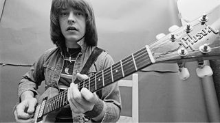 Rick Derringer poses with his Gibson Explorer backstage at the Shaboo Inn in Willimantic, Connecticut, before performing with his eponymous group, June 1976. 