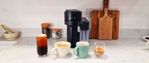 Nespresso Vertuo Lattissima next to four coffee drinks