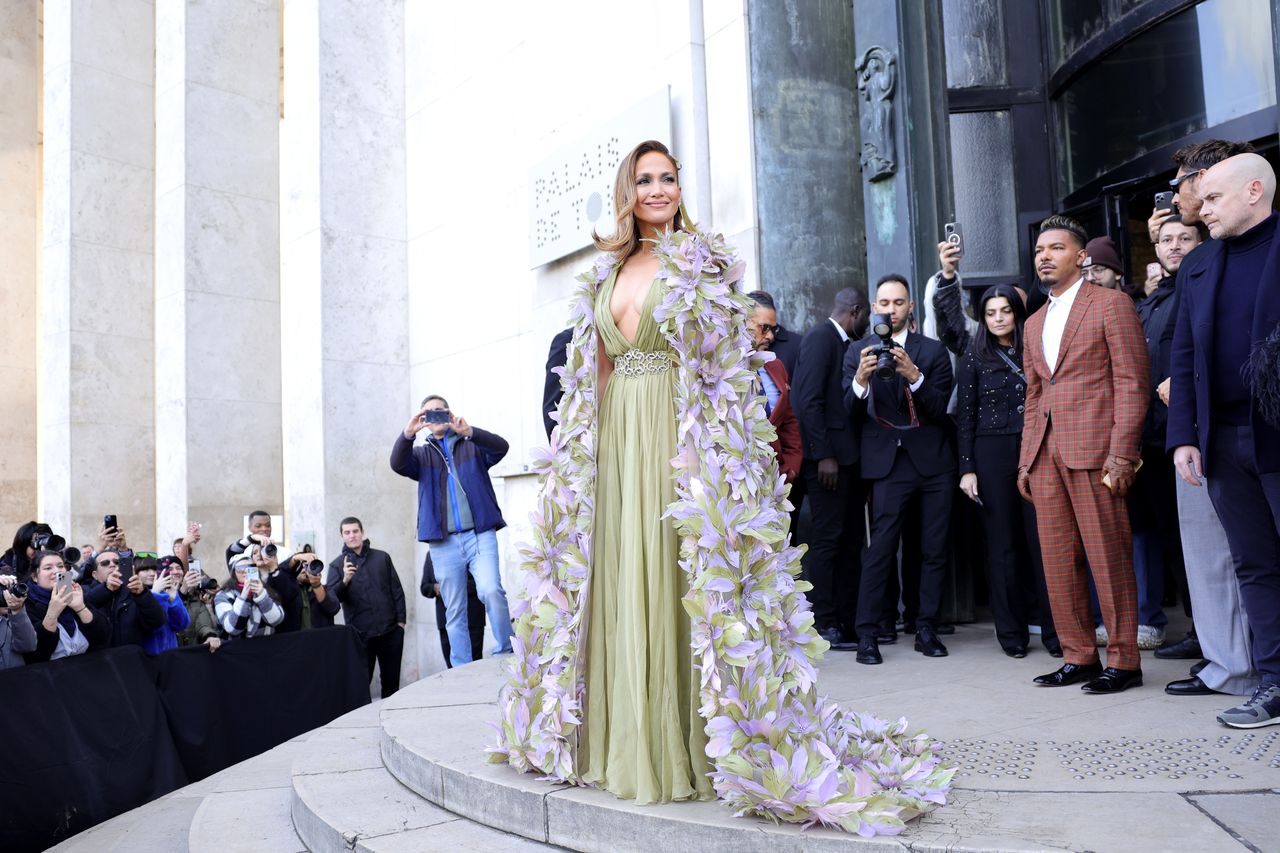 jennifer lopez in a green Elie Saab dress and flower cape