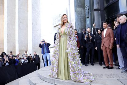 Jennifer Lopez Wore a Fairytale Flower Cape to Paris Fashion Week