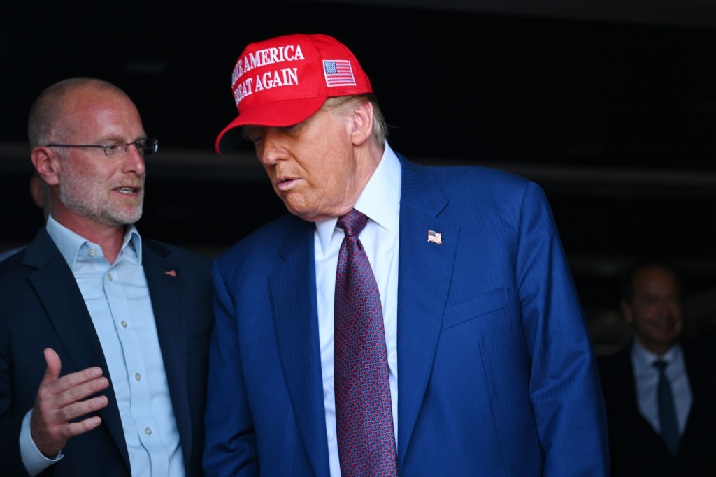 BROWNSVILLE, TEXAS - NOVEMBER 19: U.S. President-elect Donald Trump speaks to Brendan Carr, his intended pick for Chairman of the Federal Communications Commission, as he attends a viewing of the launch of the sixth test flight of the SpaceX Starship rocket on November 19, 2024 in Brownsville, Texas. SpaceX&rsquo;s billionaire owner, Elon Musk, a Trump confidante, has been tapped to lead the new Department of Government Efficiency alongside former presidential candidate Vivek Ramaswamy. (Photo by Brandon Bell/Getty Images)
