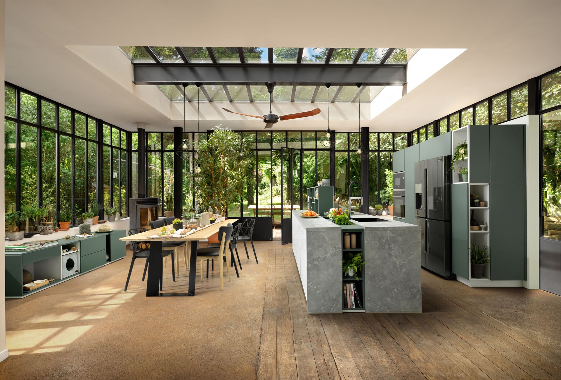 Modern kitchen ideas in a large kitchen with wall-to-wall windows and sea green cabinetry.