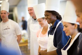 Hi-SEAS mock Mars mission participants practice cooking.