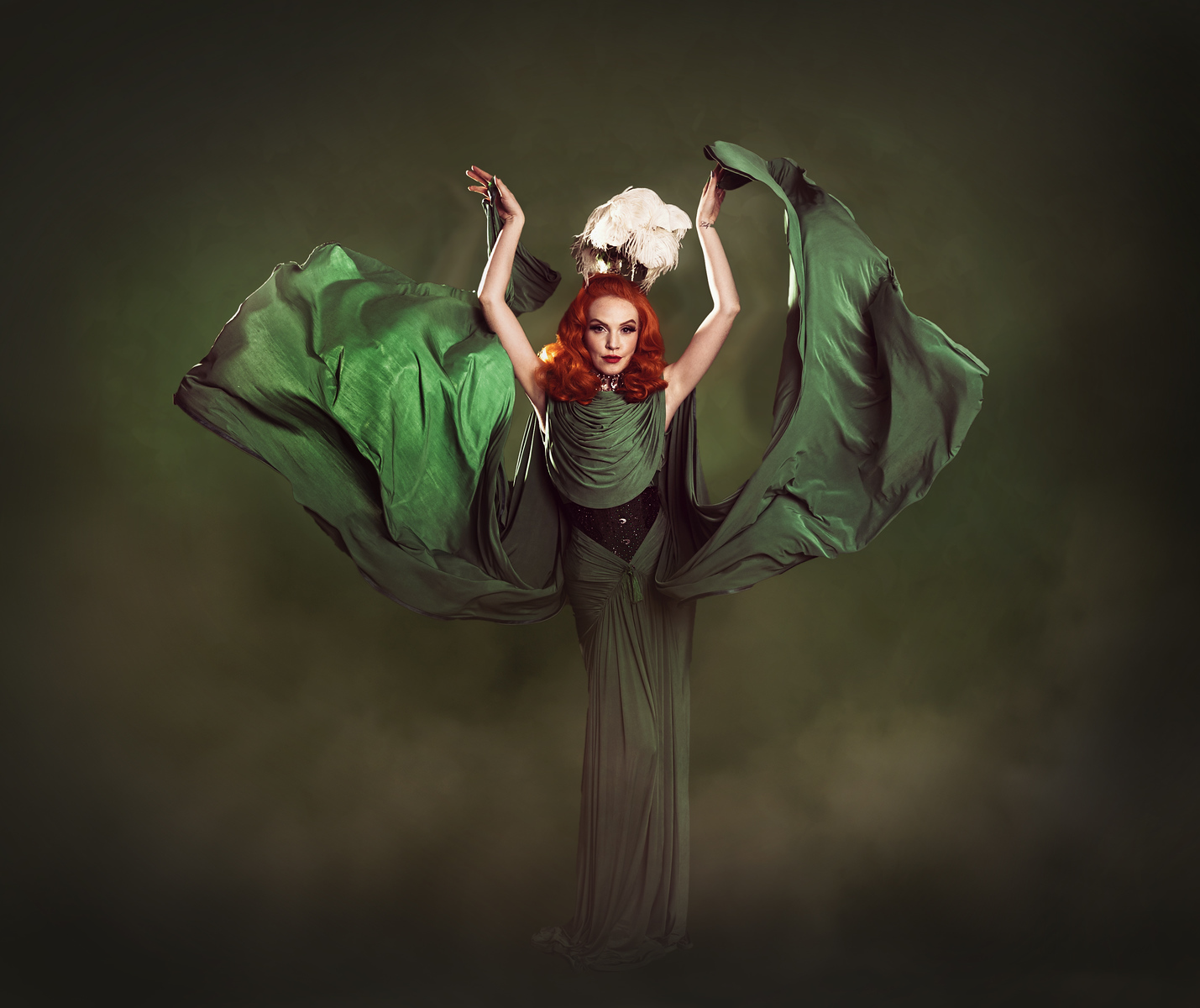 Ida Sanguine in green performing clothing