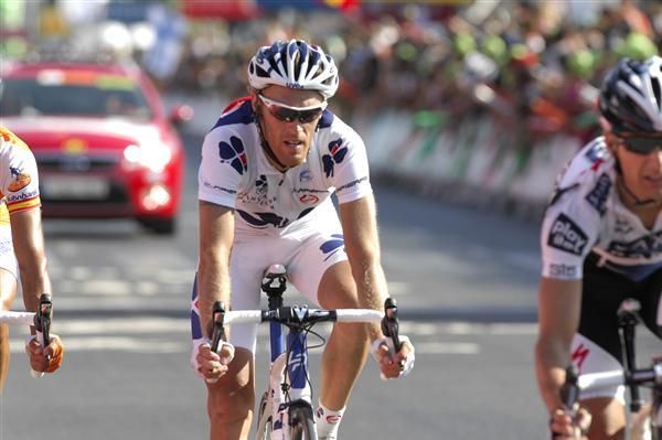 Breakaway participant Arnaud Gerard (Fran&ccedil;aise des Jeux) completes a long day in the saddle