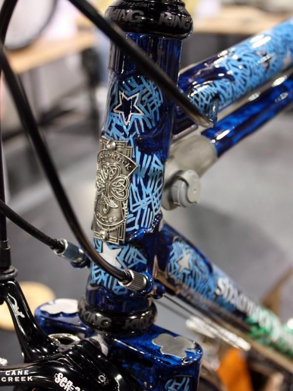 The Shamrock Cycles head tube badge is surrounded by a starry night.