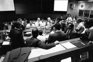 Apollo 13 flight controllers in the Mission Operations Control Room at NASA's Manned Spacecraft Center on April 16, 1970.