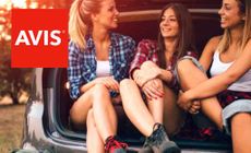 Avis logo placed over an image of three girls sitting in the boot of a car happy