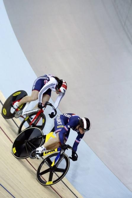 Virginie Cueff competes with Britain's Katy Marchant in the women's sprint