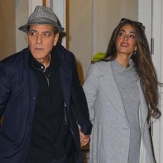 George and Amal Clooney on a date in New York City on Feb. 27 where Amal wears a date night outfit similar to a Taylor Swift favorite