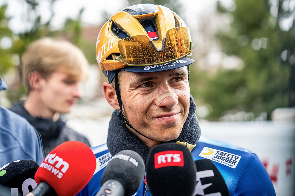 Remco Evenepoel is interviewed after competing in the fourth stage of the Tour of Romandie