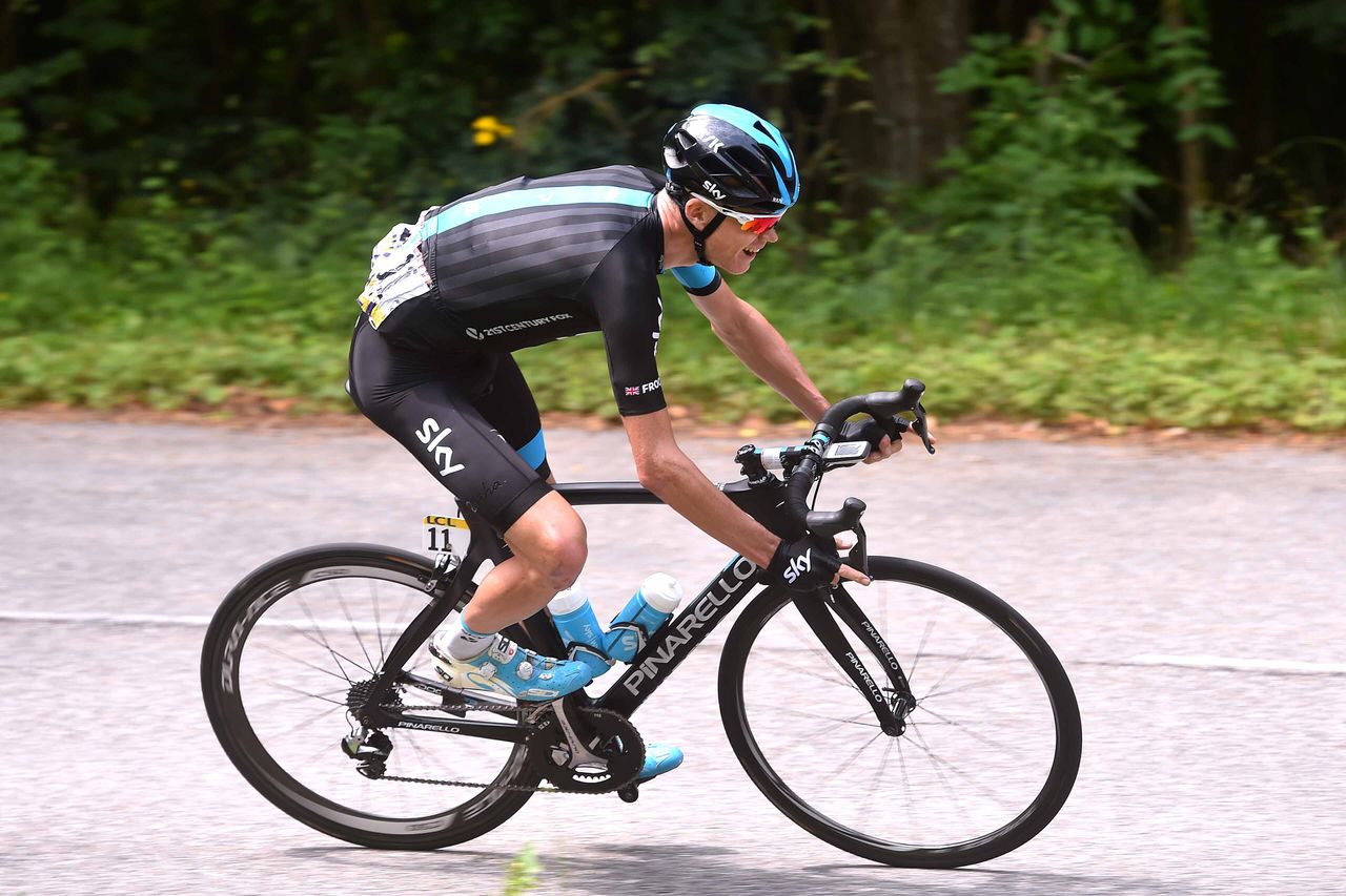Chris Froome makes his way down the descent