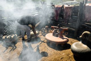 Clay stools by Andile Dyalvane outdoor in Ngobozana, Eastern Cape