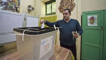 An Egyptian man votes