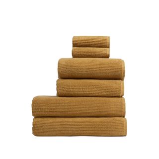 A stack of ochre bath towels