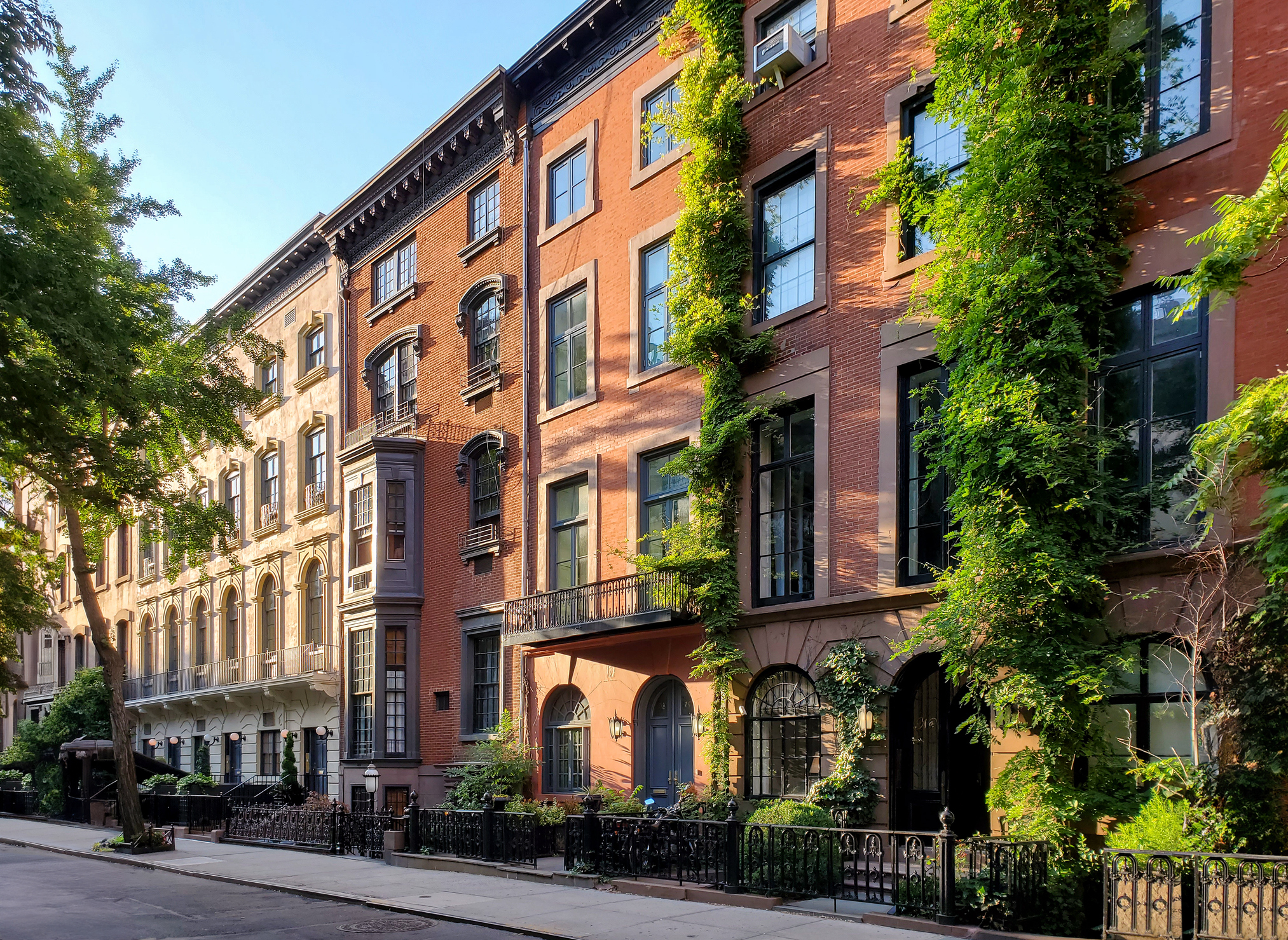 Historic block of apartment buildings on 9th Street in the Greenwich Village neighborhood of Manhattan