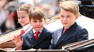 Princess Charlotte of Wales, Prince Louis of Wales and Prince George of Wales are seen during Trooping the Colour on June 17, 2023