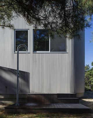 House in the Dune by Worrell Yeung, external shower