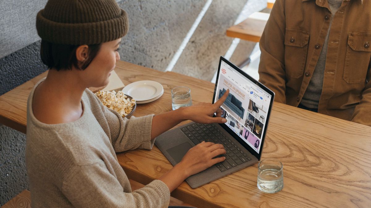 Woman using a Windows computer with Microsoft Edge