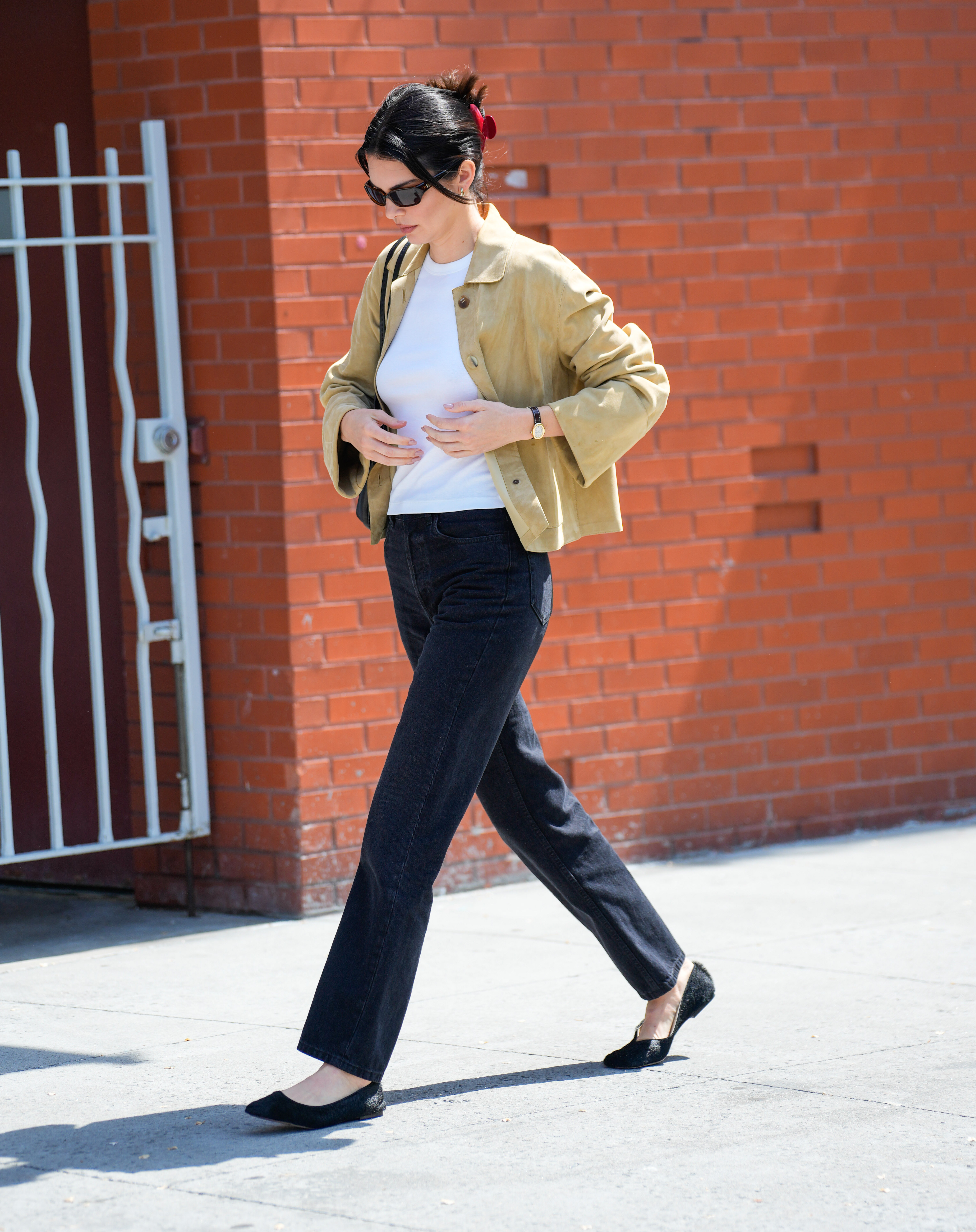 Kendall Jenner wearing cigarette jeans in May 2025