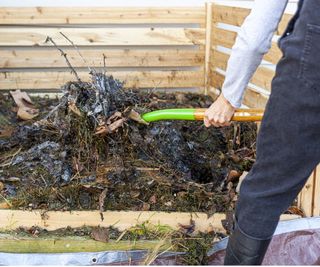 Turning compost heap