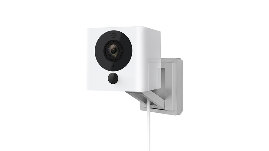 A photo of the WyzeCam V2 mounted on a white wall