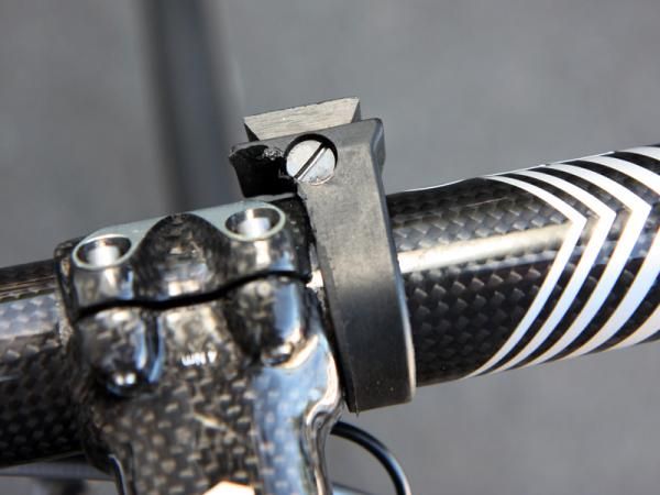 Team mechanics have modified the SRM computer mount to tuck it in tighter against the stem.