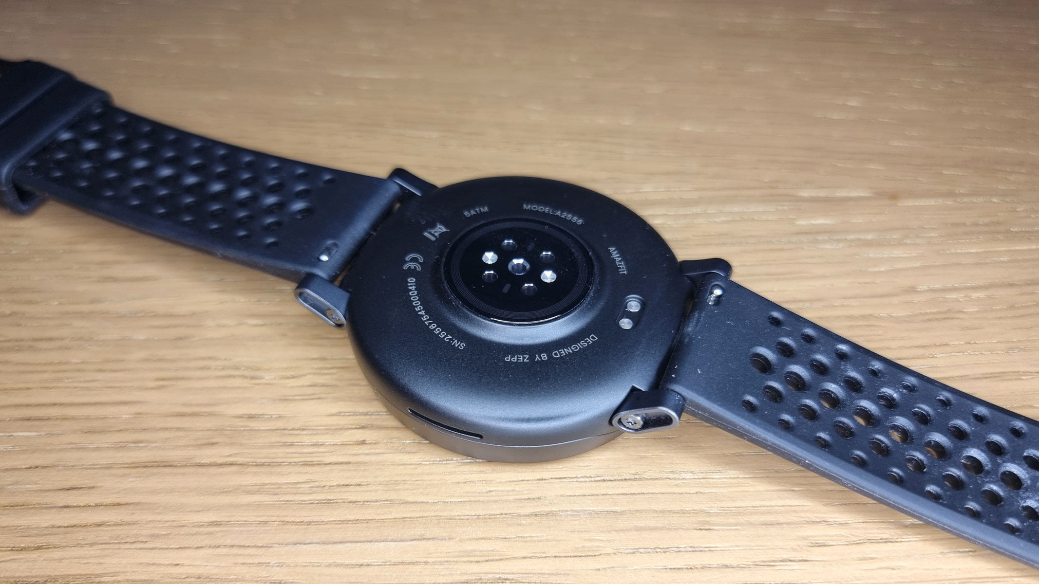 A close-up picture of the heart rate sensor in the Amazfit Active Max smartwatch