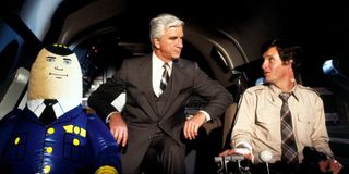 From right, Robert Hays, Leslie Nielsen, and Otto in Airplane!