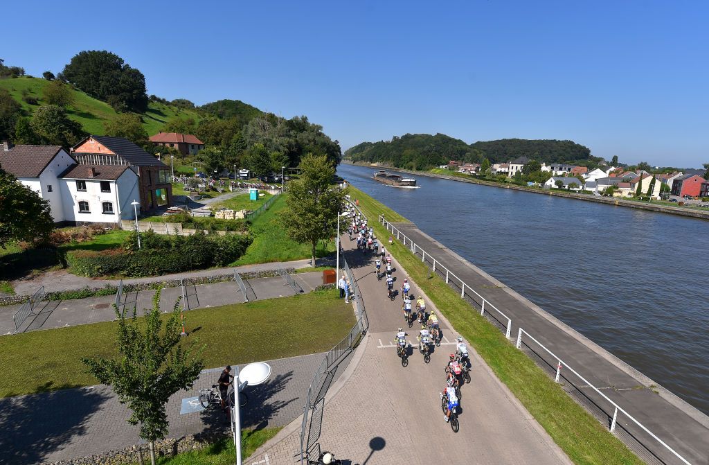 BILZEN BELGIUM SEPTEMBER 03 A general view of the peloton compete during the 17th Benelux Tour 2021 Stage 5 a 188km stage from Riemst to Bilzen BeneluxTour on September 03 2021 in Bilzen Belgium Photo by Luc ClaessenGetty Images