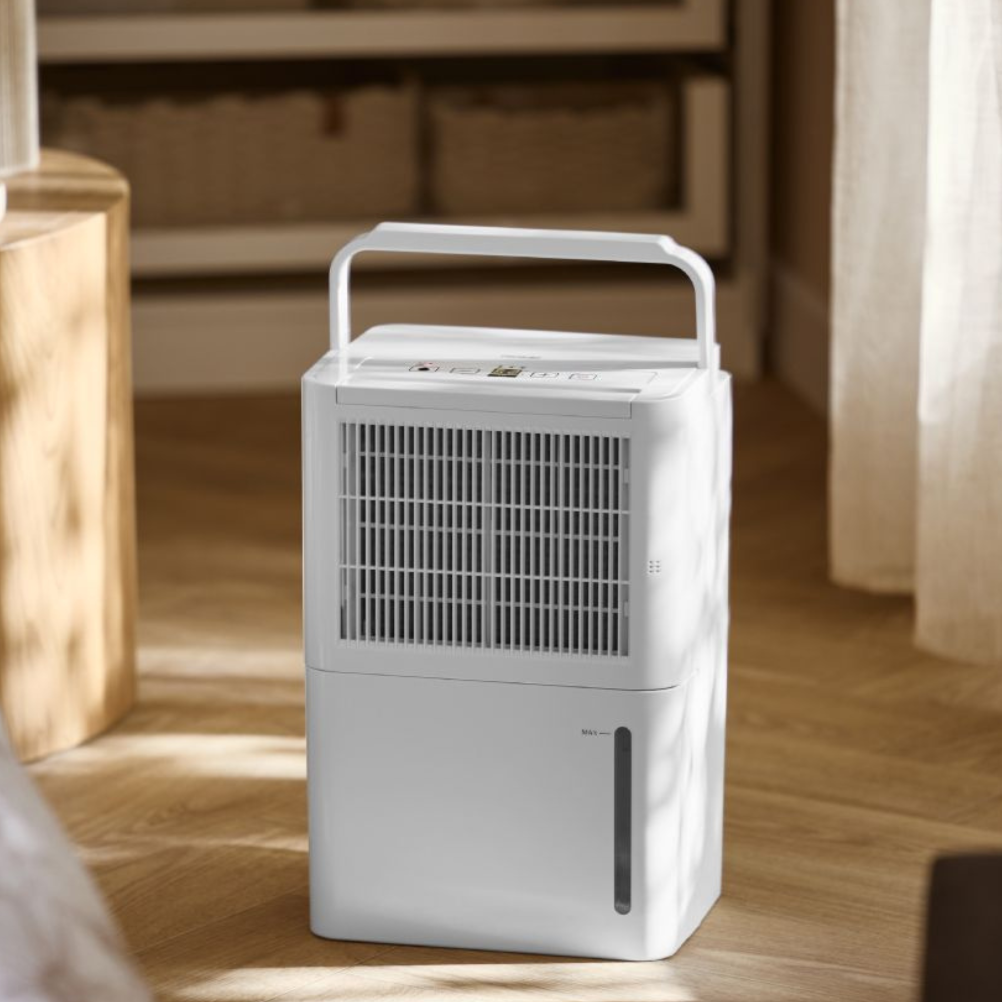 Lidl tronic dehumidifier on wood floor.