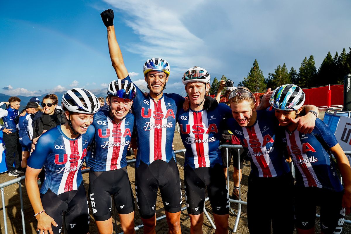 Picture by Javier Mart&Atilde;&shy;nez/SWpix.com - 28/08/2024 - Cycling - 2024 UCI Mountain Bike World Championships - Pal Arinsal, Arinsal, Andorra - Mixed Team Relay - Brayden Johnson (USA), Nicholas Konecny (USA), Haley Batten (USA), Vida Lopez de San Roman (USA), Madigan Munro (USA), Christopher Blevins (USA) celebrates winning the Mixed Team Relay