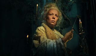 Olivia Colman's Miss Havisham is a horrific sight, as expected of her cranky character.