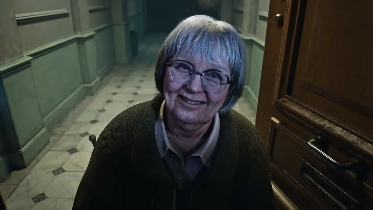 Old lady opening the door.