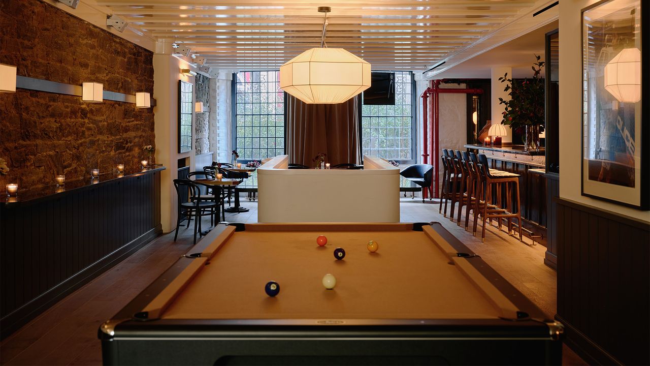 A pool table takes centre stage at a bar