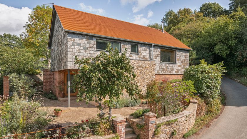 Exterior of the property which is on a bendy road