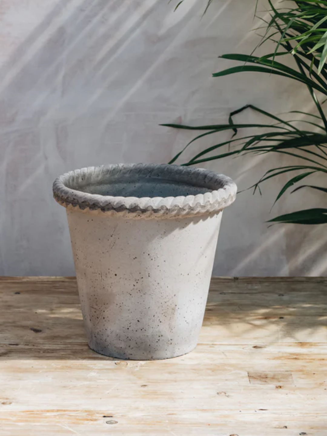 A gray planter with a textured hem from Bergs Potter