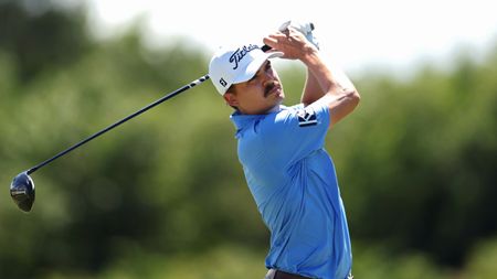 Carson Young hits a drive during a PGA Tour event