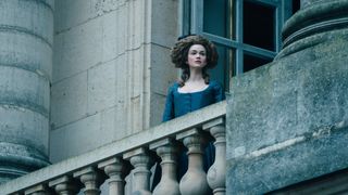 The Queen stands on a balcony in Marie Antoinette